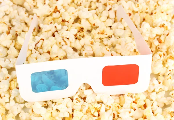 Bio glasögon på popcorn bakgrund — Stockfoto