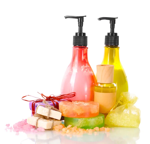 Bottles , soaps and sea salt isolated on white — Stock Photo, Image