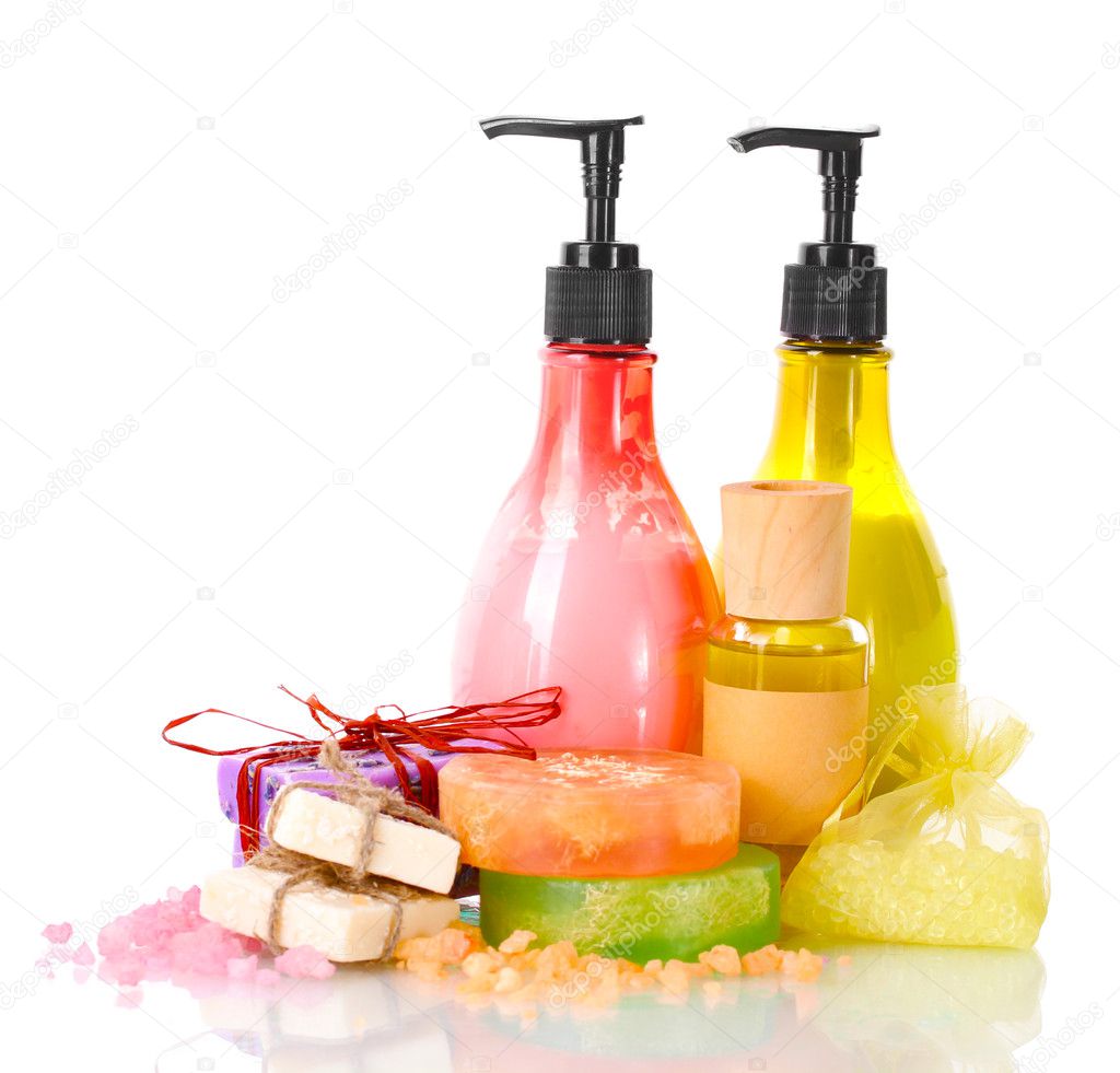 Bottles , soaps and sea salt isolated on white