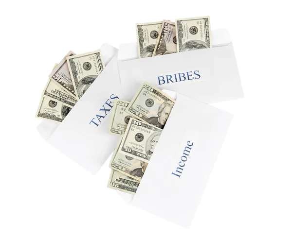 stock image The envelopes with the money bills isolated on white