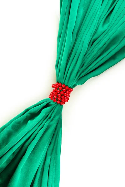 Green cloth tied with pearls isolated on white — Stock Photo, Image