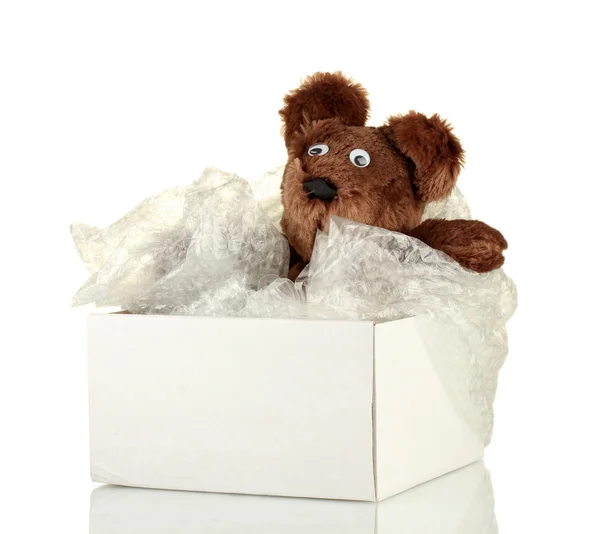 Öppnade paket med ett barns leksak isolerad på vit — Stockfoto