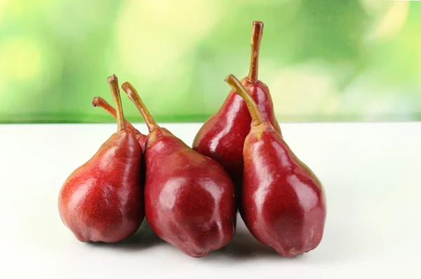 Ripe red pear on nature background — Stock Photo, Image