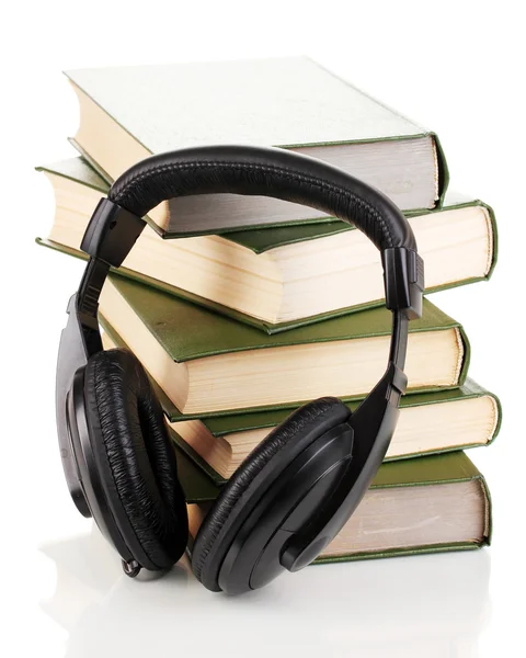 Headphones on books isolated on white — Stock Photo, Image