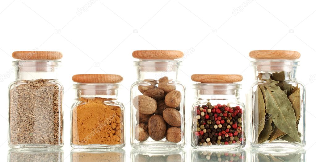 Powder spices in glass jars isolated on white Stock Photo by ...