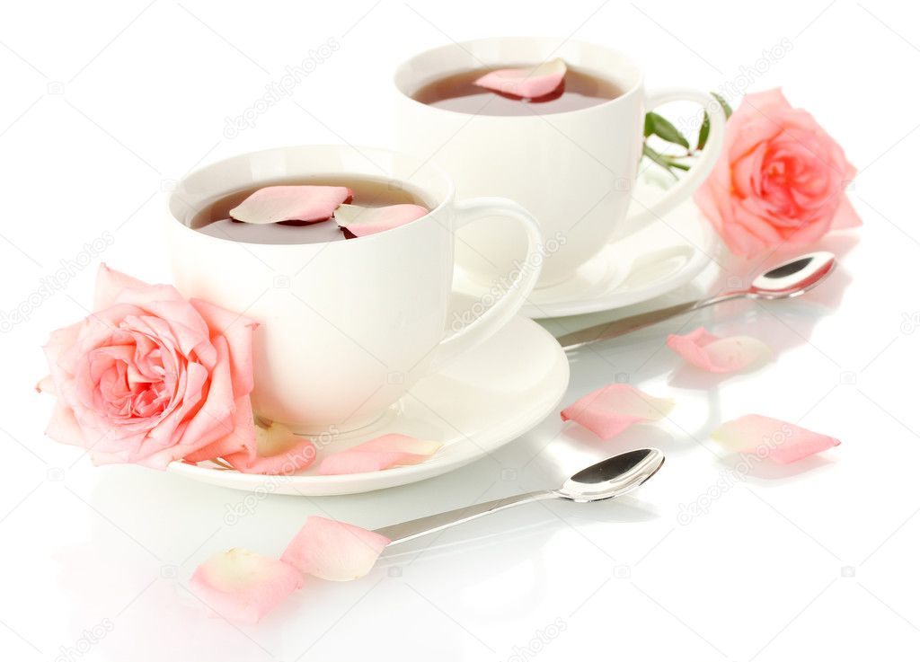 Cups of tea with rose isolated on white