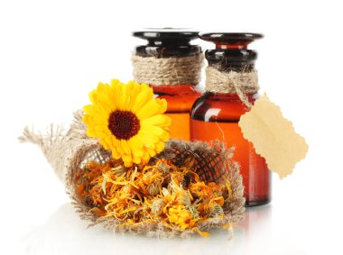 Medicine bottles and calendula, isolated on white clipart