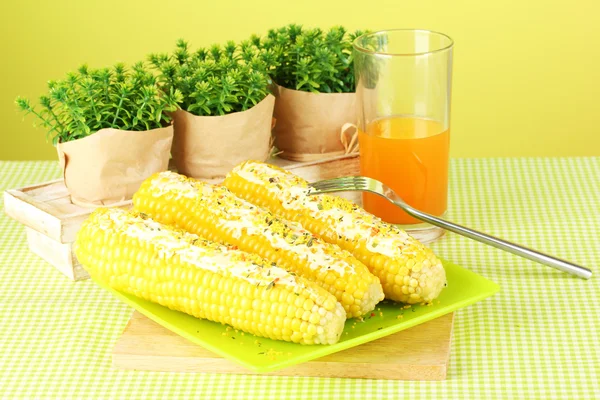 Boiled corn with butter and the juice — Stock Photo, Image