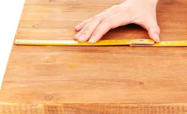 Measuring wooden board close-up — Stock Photo, Image
