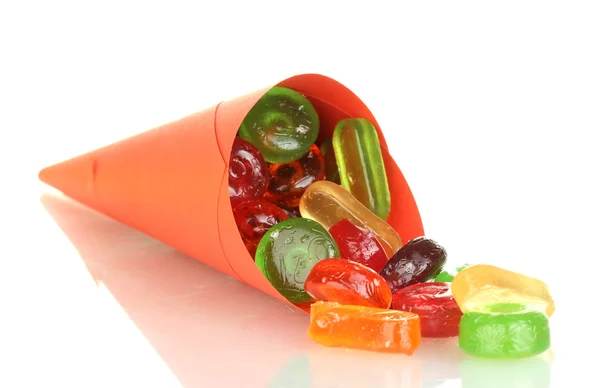 Parlak çanta üzerinde beyaz izole lezzetli renkli şekerler — Stok fotoğraf