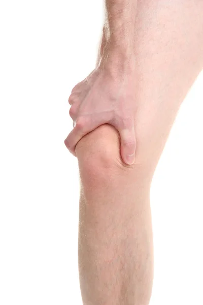 Homem segurando o joelho dolorido, isolado no branco — Fotografia de Stock