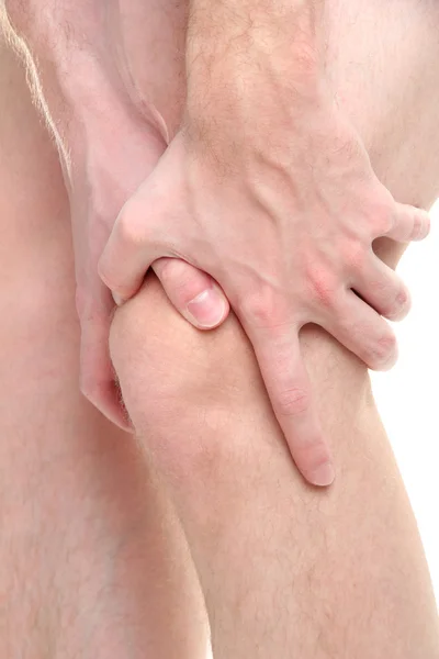 Hombre sosteniendo dolor de rodilla, aislado en blanco —  Fotos de Stock