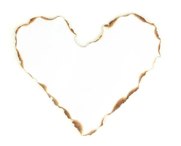 Carta bruciata a forma di cuore isolata su bianco — Foto Stock