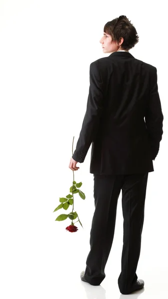 Jonge man, bloem, rode rose geïsoleerd — Stockfoto