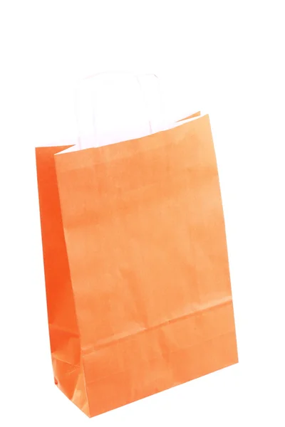 Shopping orange presentpåsar och apple isolerade — Stockfoto