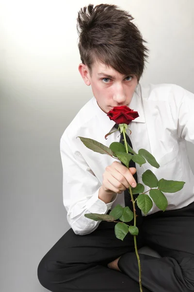 Portrait young man and rose enamoured love — Stock Photo, Image