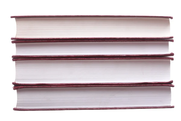 Na białym tle czerwony stos książek — Zdjęcie stockowe