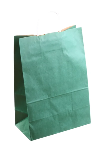 Compras bolsas de regalo verdes y manzana aislada —  Fotos de Stock