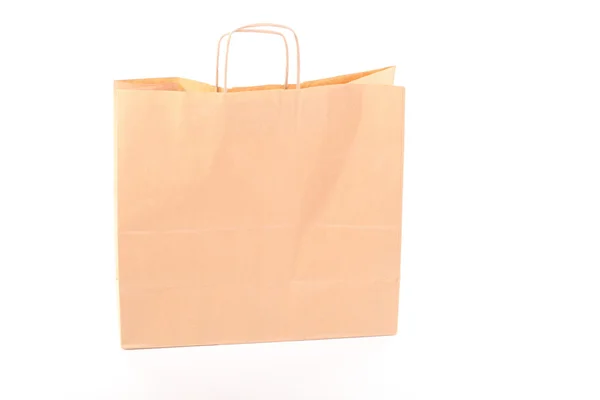 分離されたショッピングの茶色のギフト袋 — ストック写真