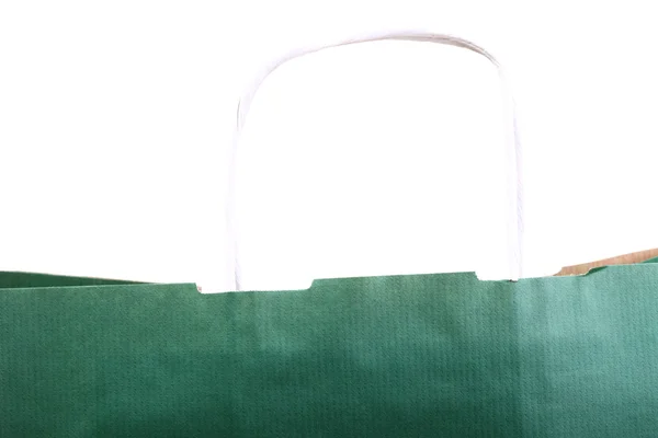 Winkelen groene geschenk zakken en apple geïsoleerd — Stockfoto