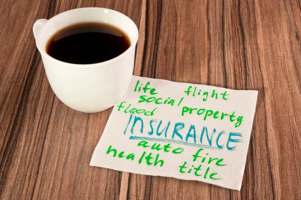 Insurance on a napkin — Stock Photo, Image