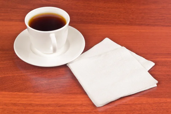Xícara de café e guardanapo — Fotografia de Stock