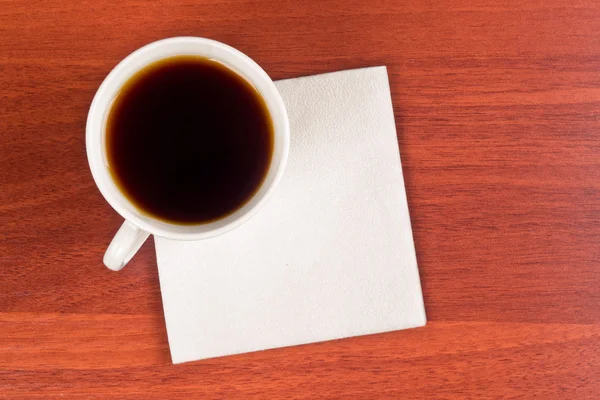 Kopp kaffe och servett — Stockfoto