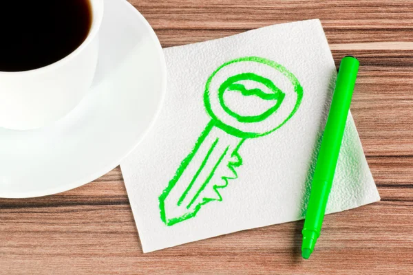 Key on a napkin — Stock Photo, Image