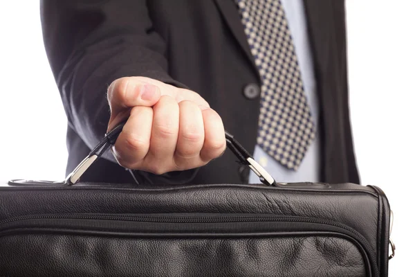 Holding a briefcase in hand — Stock Photo, Image