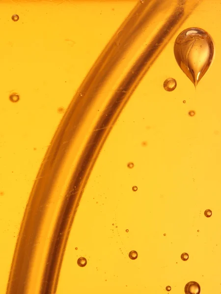 Soap bubbles orange liquid — Stock Photo, Image