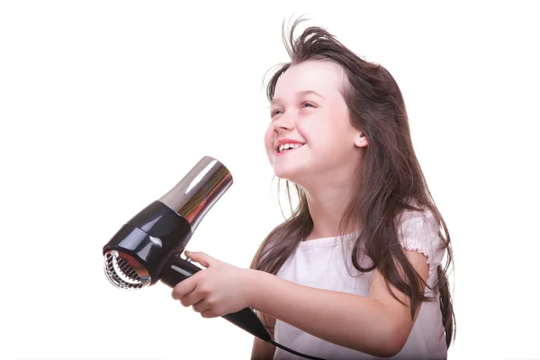 Gyermek lány szárítási haj — Stock Fotó