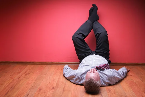 stock image Men lying in the floor