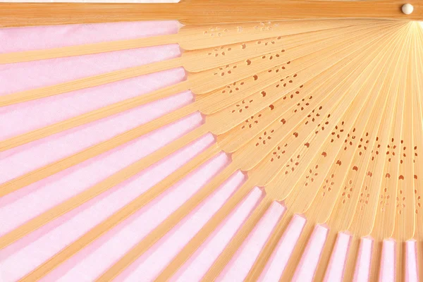 Roze geopende ventilator als achtergrond. — Stockfoto