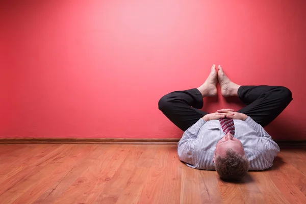 stock image Men lying in the floor