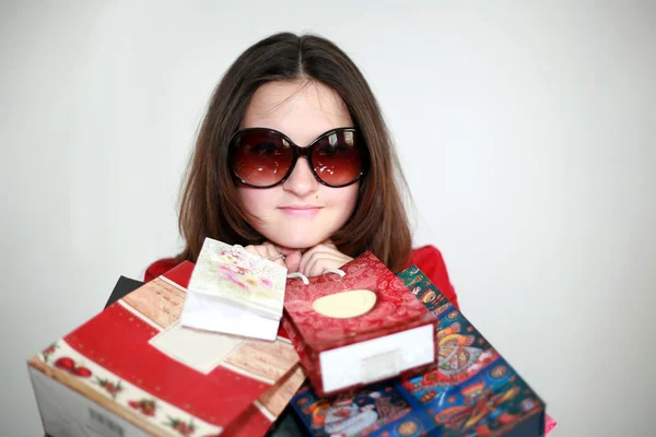 A girl in glasses after shopping — Stock Photo, Image