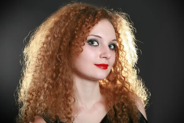 Portrait of a pretty girl curls — Stock Photo, Image