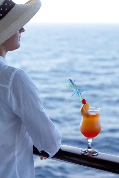 Woman with a cocktail — Stock Photo, Image