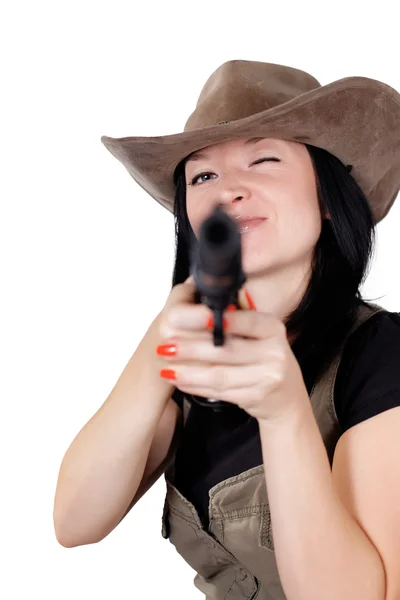Девушка в ковбойской шляпе с пистолетом — стоковое фото