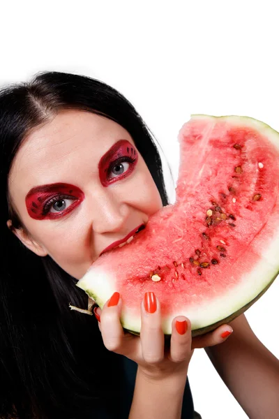 Porträt eines Mädchens, das eine Wassermelone isst — Stockfoto