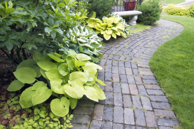 Garden Paver Path with Plants and Grass clipart