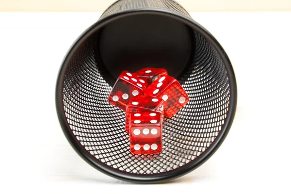 Red dice inside a container — Stock Photo, Image