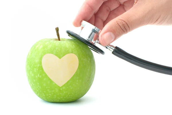 Estetoscópio e maçã do coração — Fotografia de Stock