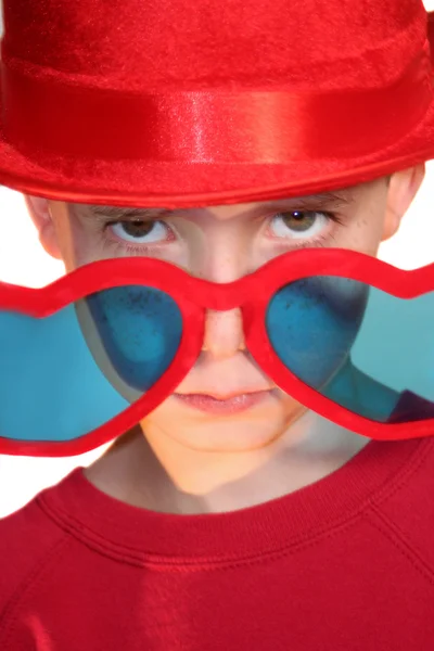 stock image Boy Peeking Over Heart-Shaped Glasses