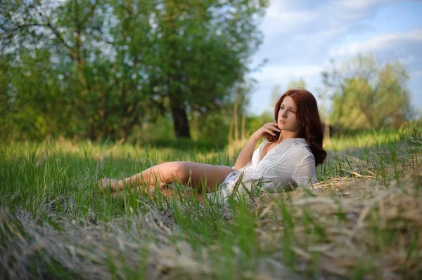 A beautiful girl with red hair — Stock Photo, Image