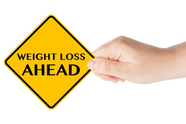 Weight Loss ahead traffic sign with hand — Stock Photo, Image