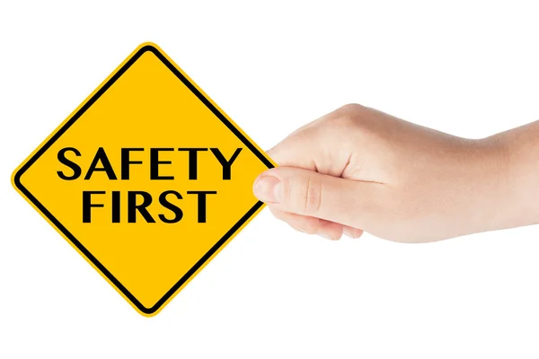 Safety First traffic sign with hand — Stock Photo, Image