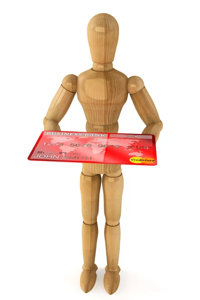 Wooden dummy with credit card — Stock Photo, Image