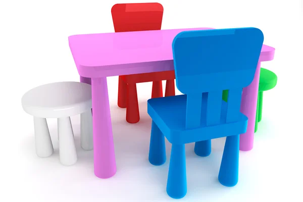 Colorful plastic kid chairs and table — Stock Photo, Image