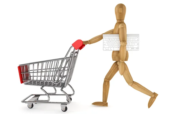 Alışveriş sepeti ve klavye ile tahta kukla — Stok fotoğraf