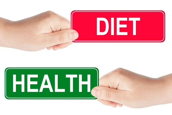 Diet and Health traffic sign in the hand — Stock Photo, Image